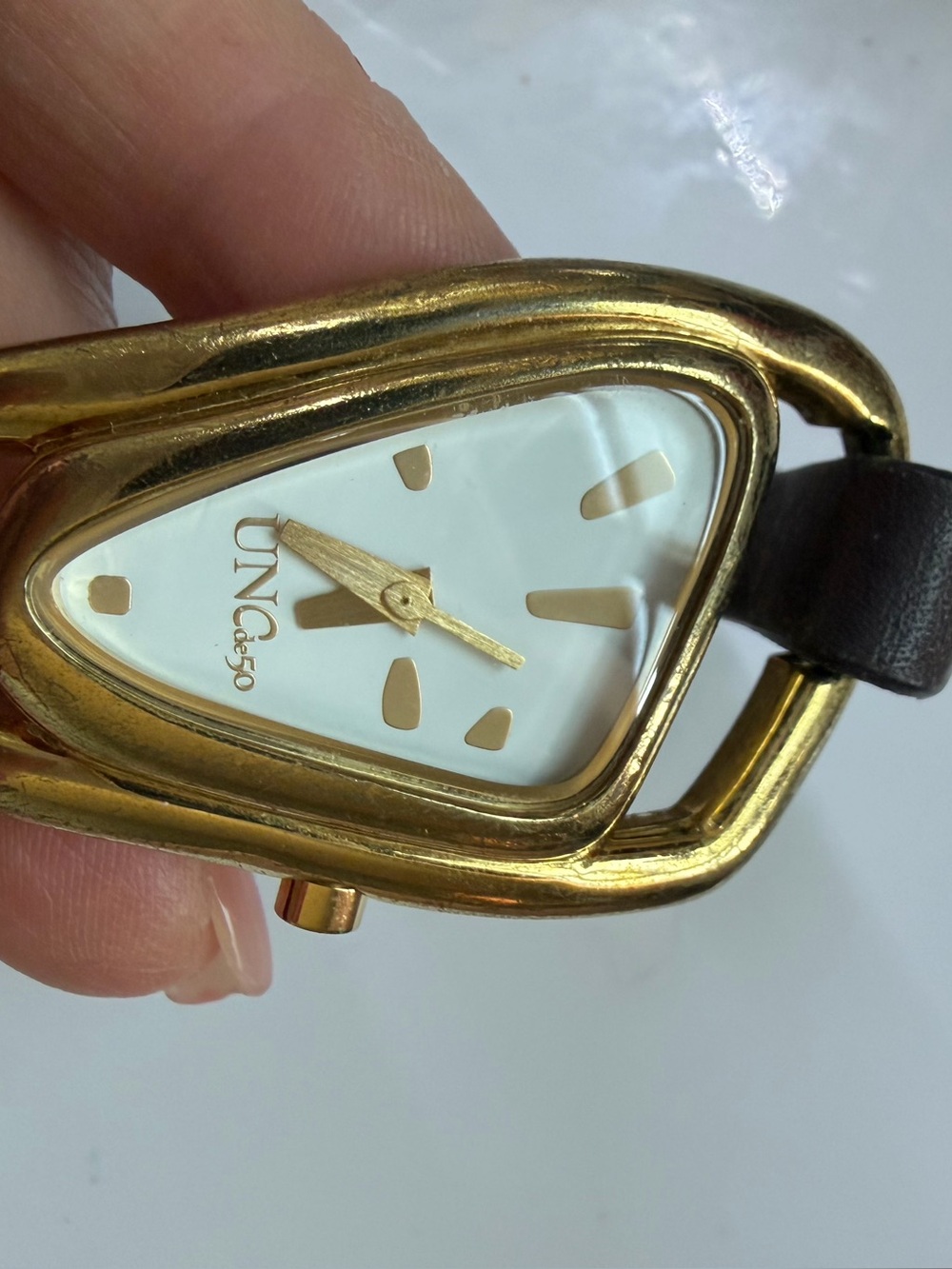 Bathed 18K gold-leather and metal watch